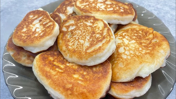 Papanași de casă delicioși cu brânză de vaci și mere - Rețetă tradițională